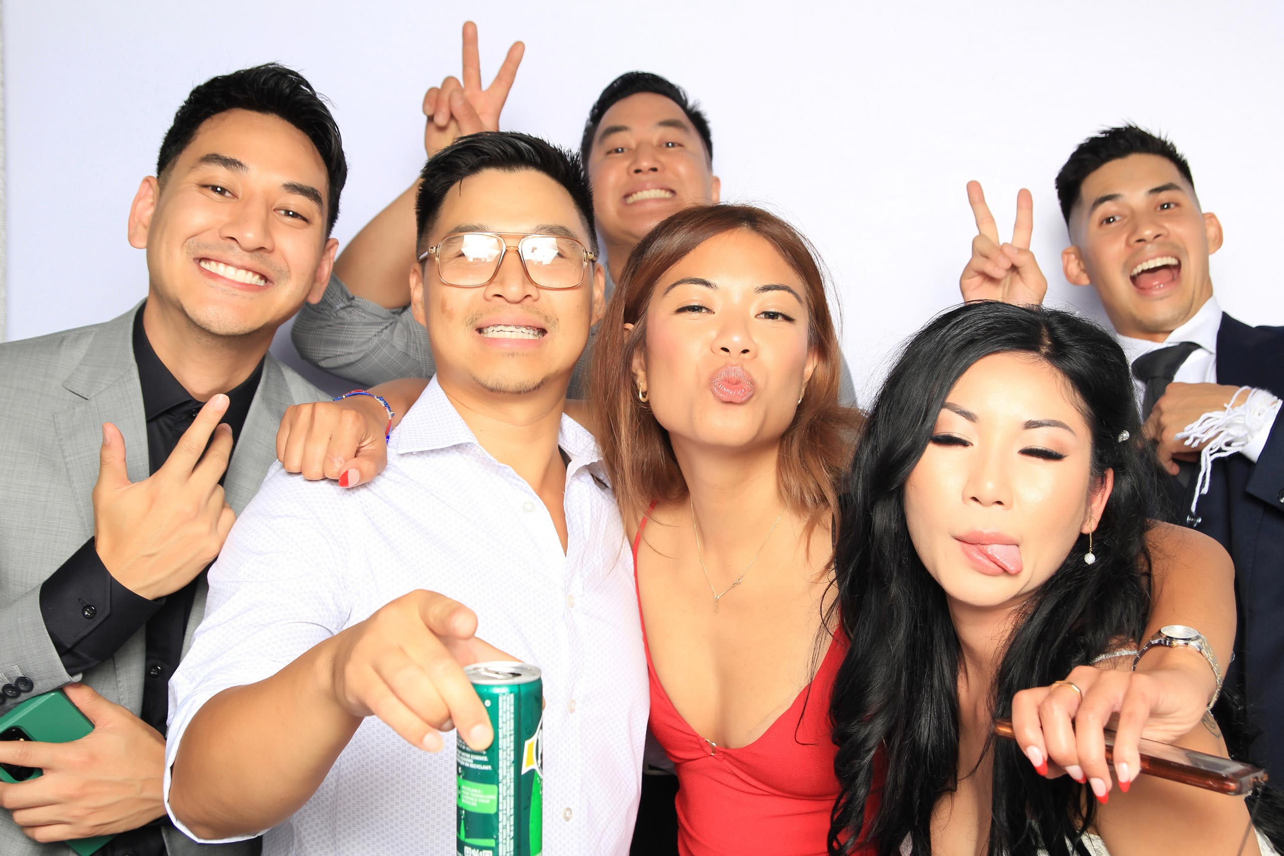 posing with sunglasses in photo booth